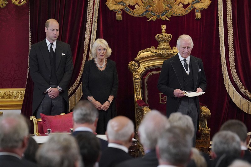 Britain Royals From left, Britain's Prince William, Camilla, the Queen Consort, King Charles III and Lord President of the Council Penny Mordaunt, before Privy Council members in the Throne Room during the Accession Council at St James's Palace, London, Saturday, Sept. 10, 2022, where King Charles III is formally proclaimed monarch. (Jonathan Brady/Pool Photo via AP)