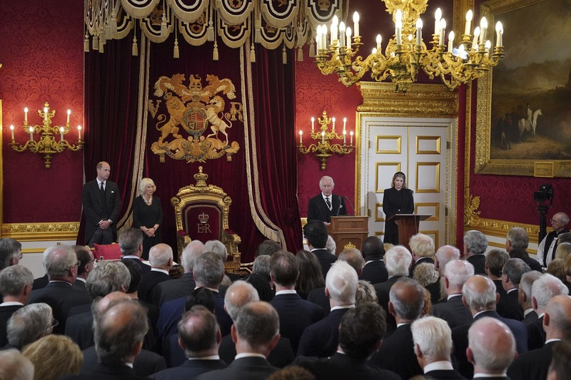 Britain Royals From left, Britain's Prince William, Camilla, the Queen Consort, King Charles III and Lord President of the Council Penny Mordaunt, before Privy Council members in the Throne Room during the Accession Council at St James's Palace, London, Saturday, Sept. 10, 2022, where King Charles III is formally proclaimed monarch. (Jonathan Brady/Pool Photo via AP)