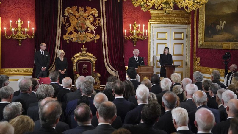 From left, Britain's Prince William, Camilla, the Queen Consort, King Charles III and Lord President of the Council Penny Mordaunt, before Privy Council members in the Throne Room during the Accession Council at St James's Palace, London, Saturday, Sept. 10, 2022, where King Charles III is formally proclaimed monarch. (Jonathan Brady/Pool Photo via AP)