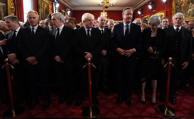 From left, Britain's Prince William, Camilla, the Queen Consort, King Charles III and Lord President of the Council Penny Mordaunt, before Privy Council members in the Throne Room during the Accession Council at St James's Palace, London, Saturday, Sept. 10, 2022, where King Charles III is formally proclaimed monarch. (Jonathan Brady/Pool Photo via AP)