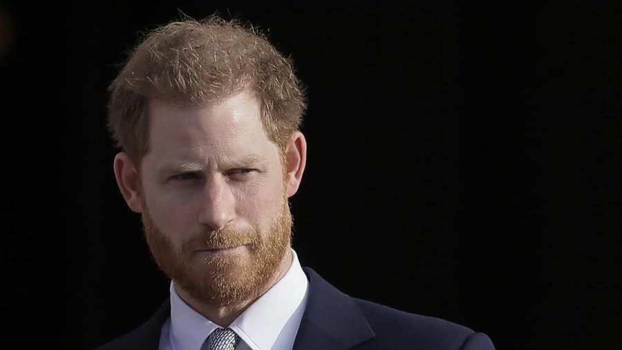 FILE - Britain's Prince Harry arrives in the gardens of Buckingham Palace in London, Thursday, Jan. 16, 2020.  (AP Photo/Kirsty Wigglesworth, File)
