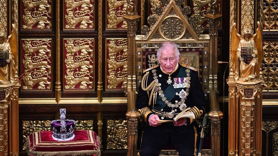 Britain's Prince Charles sits by the The Imperial State Crown in the House of Lords Chamber, during the State Opening of Parliament, in the Houses of Parliament, in London, Tuesday, May 10, 2022. Britain’s Conservative government made sweeping promises to cut crime, improve health care and revive the pandemic-scarred economy as it laid the laws it plans in the next year in a tradition-steeped ceremony known as the Queen’s Speech -- but without a key player, Queen Elizabeth II, absent for the first time in six decades. The 96-year-old monarch pulled out of the ceremonial State Opening of Parliament because of what Buckingham Palace calls “episodic mobility issues.” Her son and heir, Prince Charles, stood in, rattling through a short speech laying out 38 bills the government plans to pass. (Ben Stansall/Pool Photo via AP)