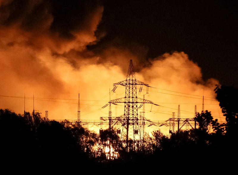 UKRAINE-CRISIS/KHARKIV-BLACKOUT A view shows a burning 5th thermal power plant hit by a Russian missile strike, amid Russia's attack on Ukraine, in Kharkiv, Ukraine September 11, 2022. REUTERS/Gleb Garanish