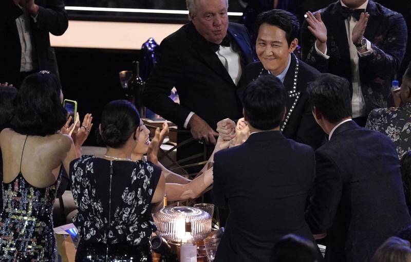 Lee Jung-jae  holds his trophy for Outstanding Lead Actor In A Drama Series for 