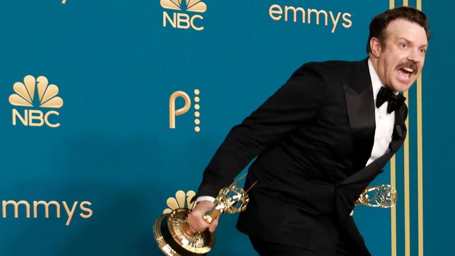 Lee Jung-jae  holds his trophy for Outstanding Lead Actor In A Drama Series for 