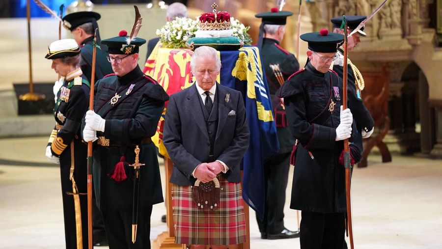 Britain's King Charles III, center, and other members of the royal family hold a vigil at the coffin of Queen Elizabeth II at St Giles' Cathedral, Edinburgh, Scotland,  Monday Sept. 12, 2022. (Jane Barlow/Pool via AP)