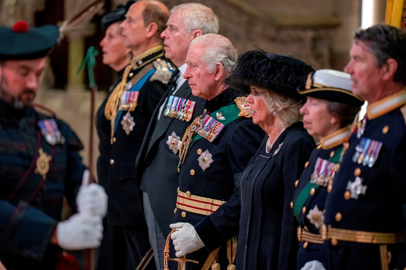 Britain's King Charles III, center, and other members of the royal family hold a vigil at the coffin of Queen Elizabeth II at St Giles' Cathedral, Edinburgh, Scotland,  Monday Sept. 12, 2022. (Jane Barlow/Pool via AP)