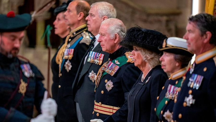 Britain's King Charles III, center, and other members of the royal family hold a vigil at the coffin of Queen Elizabeth II at St Giles' Cathedral, Edinburgh, Scotland,  Monday Sept. 12, 2022. (Jane Barlow/Pool via AP)