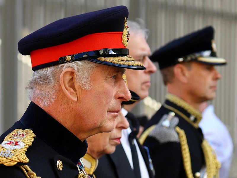 Britain Royals Britain's King Charles III, center, and other members of the royal family hold a vigil at the coffin of Queen Elizabeth II at St Giles' Cathedral, Edinburgh, Scotland, Monday Sept. 12, 2022. (Jane Barlow/Pool via AP)