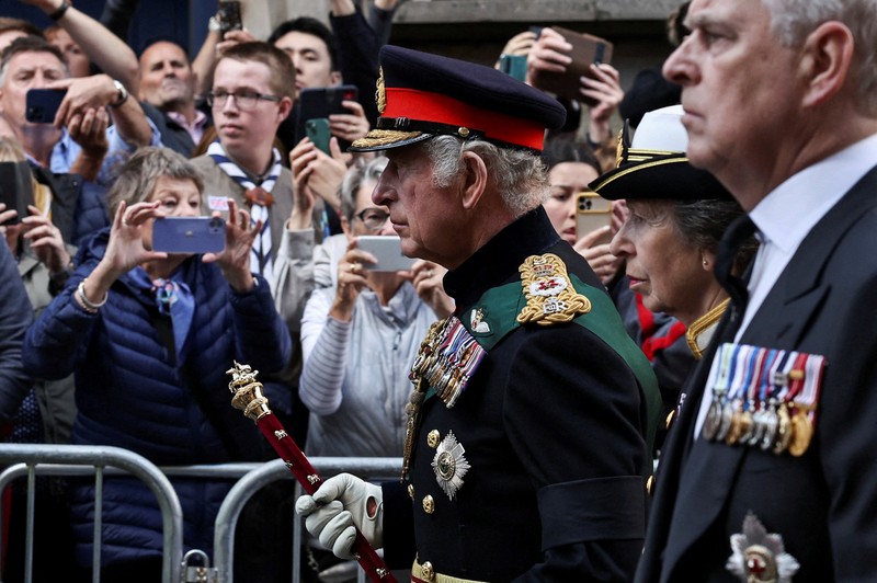 Britain Royals Britain's King Charles III, center, and other members of the royal family hold a vigil at the coffin of Queen Elizabeth II at St Giles' Cathedral, Edinburgh, Scotland, Monday Sept. 12, 2022. (Jane Barlow/Pool via AP)