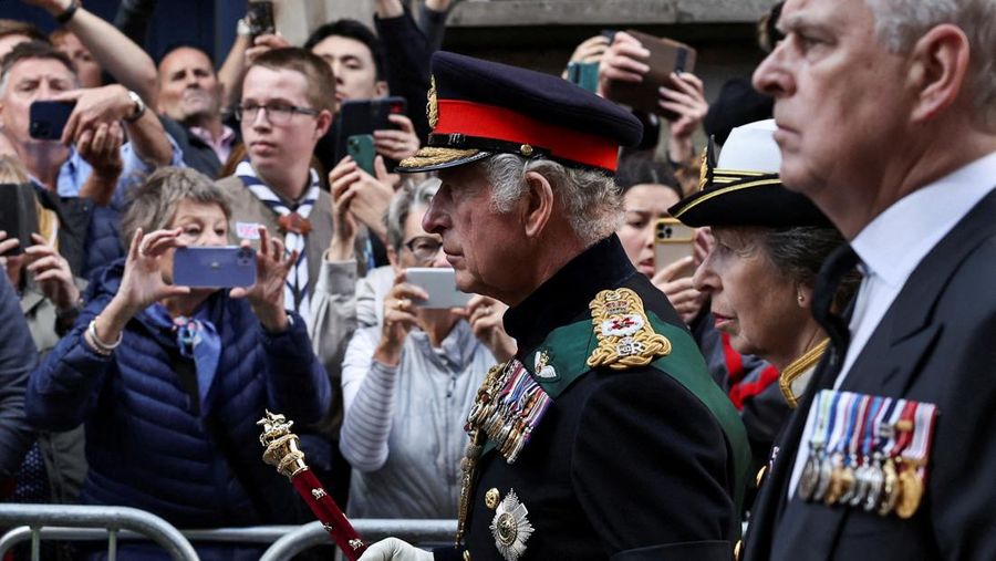 Britain's King Charles III, center, and other members of the royal family hold a vigil at the coffin of Queen Elizabeth II at St Giles' Cathedral, Edinburgh, Scotland,  Monday Sept. 12, 2022. (Jane Barlow/Pool via AP)