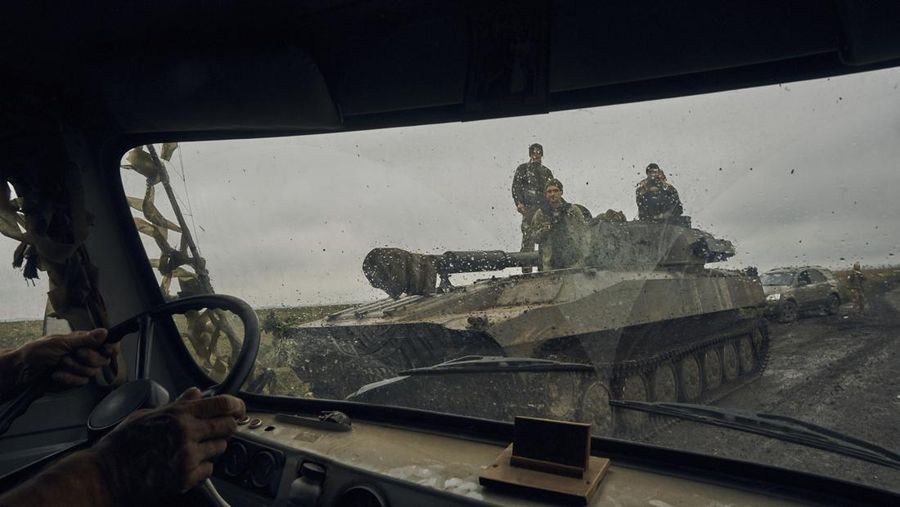 A Ukrainian tank on the road in the freed territory in the Kharkiv region, Ukraine, Monday, Sept. 12, 2022. Ukrainian troops retook a wide swath of territory from Russia on Monday, pushing all the way back to the northeastern border in some places, and claimed to have captured many Russian soldiers as part of a lightning advance that forced Moscow to make a hasty retreat. (AP Photo/Kostiantyn Liberov)