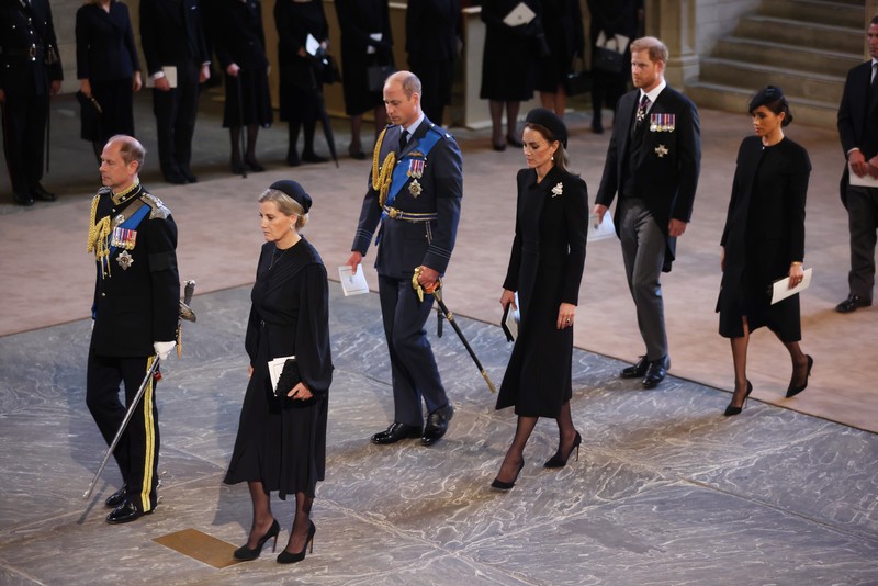 1423626853 LONDON, ENGLAND - SEPTEMBER 14: David Armstrong-Jones, 2nd Earl of Snowdon, Prince William, Prince of Wales, King Charles III, Anne, Princess Royal, Prince Harry, Duke of Sussex, Timothy Laurence, Prince Andrew, Duke of York and Mr Peter Phillips walk behind the coffin during the procession for the Lying-in State of Queen Elizabeth II on September 14, 2022 in London, England. Queen Elizabeth II's coffin is taken in procession on a Gun Carriage of The King's Troop Royal Horse Artillery from Buckingham Palace to Westminster Hall where she will lay in state until the early morning of her funeral. Queen Elizabeth II died at Balmoral Castle in Scotland on September 8, 2022, and is succeeded by her eldest son, King Charles III. (Photo by Chris Jackson/Getty Images)