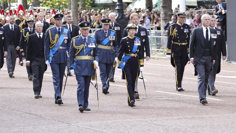 LONDON, ENGLAND - SEPTEMBER 14: David Armstrong-Jones, 2nd Earl of Snowdon, Prince William, Prince of Wales, King Charles III, Anne, Princess Royal, Prince Harry, Duke of Sussex, Timothy Laurence, Prince Andrew, Duke of York and Mr Peter Phillips walk behind the coffin during the procession for the Lying-in State of Queen Elizabeth II on September 14, 2022 in London, England. Queen Elizabeth II's coffin is taken in procession on a Gun Carriage of The King's Troop Royal Horse Artillery from Buckingham Palace to Westminster Hall where she will lay in state until the early morning of her funeral. Queen Elizabeth II died at Balmoral Castle in Scotland on September 8, 2022, and is succeeded by her eldest son, King Charles III.  (Photo by Chris Jackson/Getty Images)