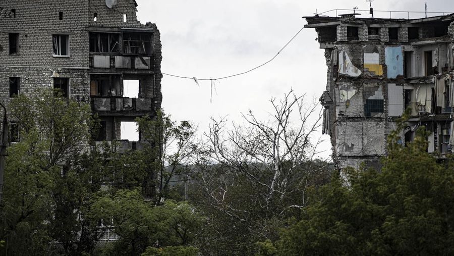 IZIUM, KHARKIV, UKRAINE - SEPTEMBER 14: Damaged buildings are seen at the Izium city after Russian Forces withdrawal as Russia-Ukraine war continues in, Kharkiv Oblast, Ukraine on September 14, 2022. (Photo by Metin Aktas/Anadolu Agency via Getty Images)