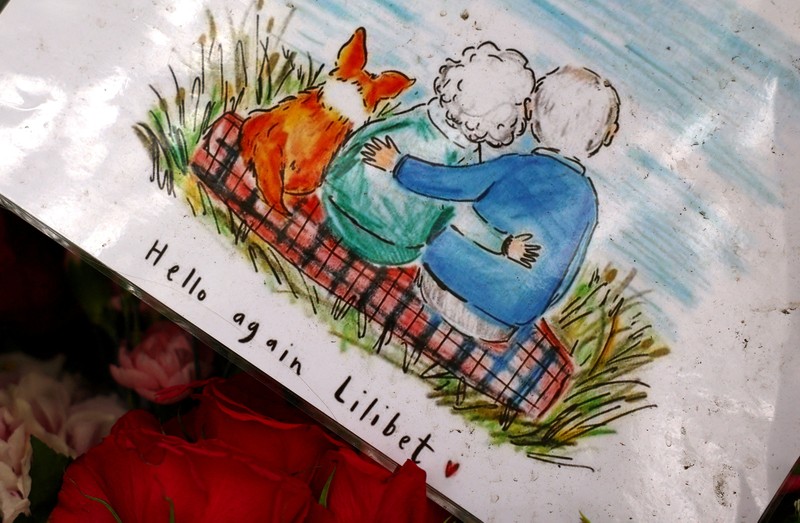 BRITAIN-ROYALS/QUEEN A combination of pictures shows handwritten and drawn tribute messages in respect for Britain's Queen Elizabeth, following her death, at Green Park in London, Britain September 15, 2022. REUTERS/Kai Pfaffenbach