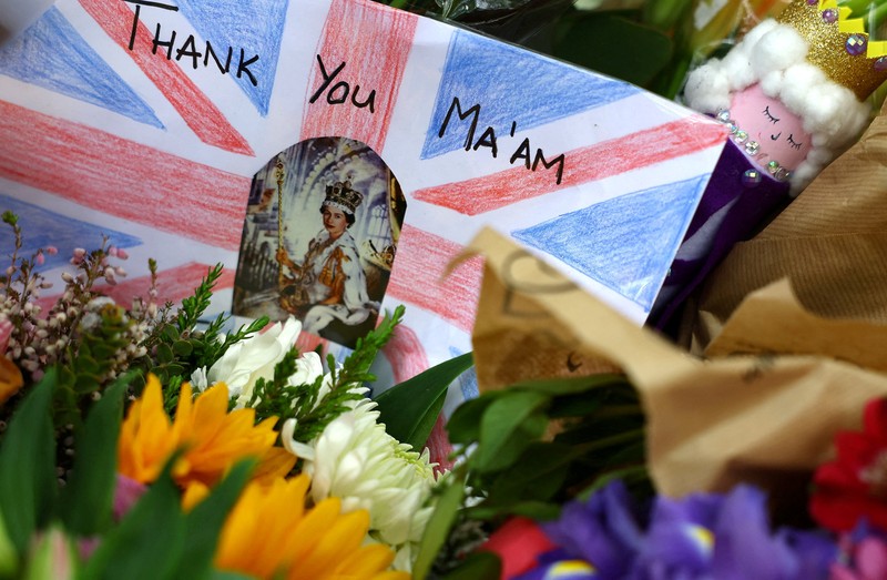 A combination of pictures shows handwritten and drawn tribute messages in respect for Britain's Queen Elizabeth, following her death, at Green Park in London, Britain September 15, 2022.  REUTERS/Kai Pfaffenbach