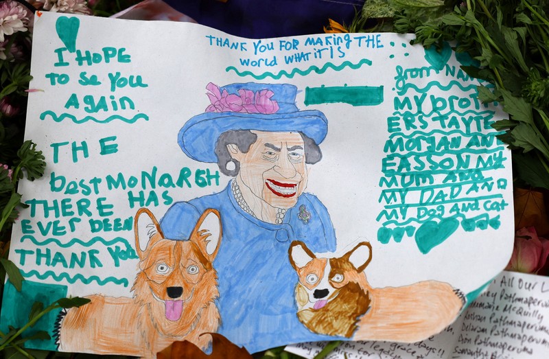 A combination of pictures shows handwritten and drawn tribute messages in respect for Britain's Queen Elizabeth, following her death, at Green Park in London, Britain September 15, 2022.  REUTERS/Kai Pfaffenbach