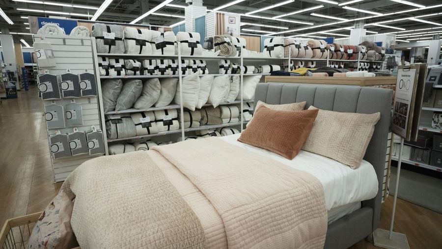 A bed and bedding are displayed in a Bed, Bath and Beyond store, Thursday, March 25, 2021, in New York. The company reports earnings, April 13, 2021. (AP Photo/Mark Lennihan)