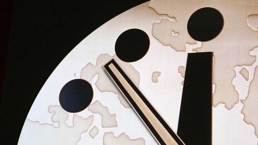 401642 02: The hands of the Bulletin of the Atomic Scientists 