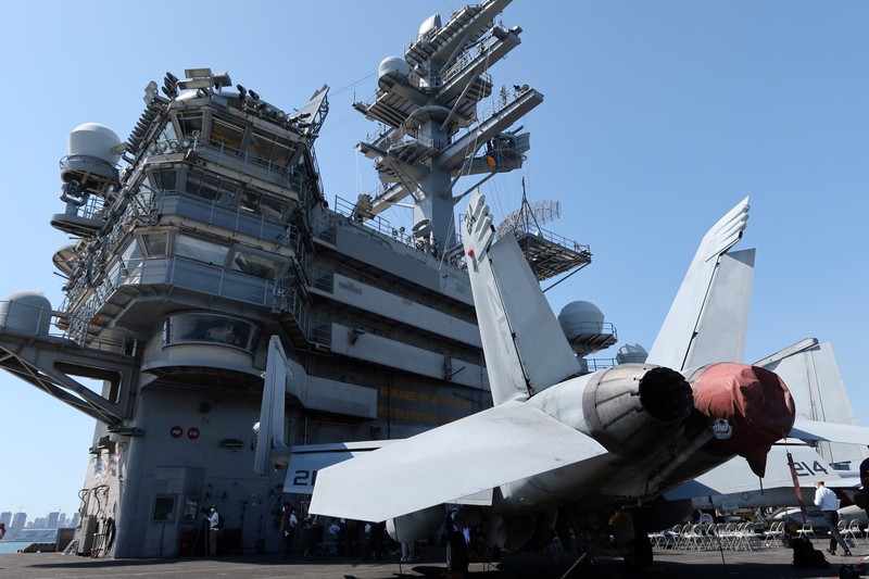 Kapal induk Angkatan Laut AS USS Ronald Reagan berlabuh di sebuah pelabuhan di Busan, Korea Selatan Kapal induk Angkatan Laut AS USS Ronald Reagan berlabuh di sebuah pelabuhan di Busan, Korea Selatan, Jumat (23/9/2022). (REUTERS/Daewoung Kim)