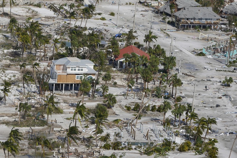 Tropical Weather Damaged homes and debris are shown in the wake of Hurricane Ian, Thursday, Sept. 29, 2022, in Fort Myers Beach, Fla. (AP Photo/Wilfredo Lee)