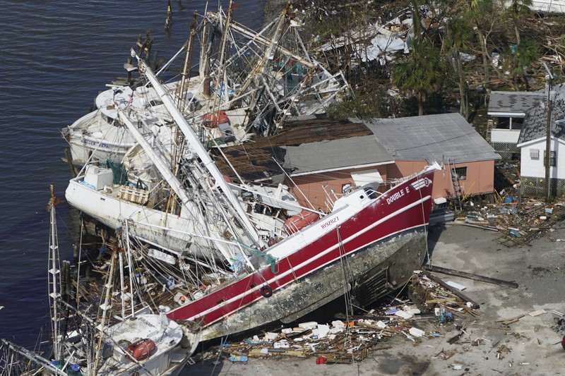 Damaged homes and debris are shown in the wake of Hurricane Ian, Thursday, Sept. 29, 2022, in Fort Myers Beach, Fla. (AP Photo/Wilfredo Lee)