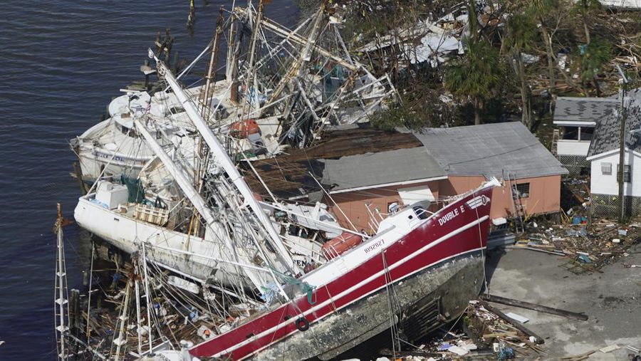 Damaged homes and debris are shown in the wake of Hurricane Ian, Thursday, Sept. 29, 2022, in Fort Myers Beach, Fla. (AP Photo/Wilfredo Lee)