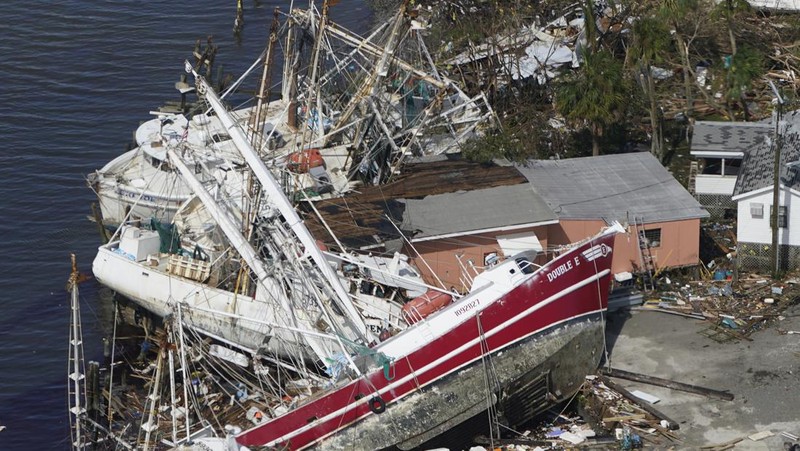 Damaged homes and debris are shown in the wake of Hurricane Ian, Thursday, Sept. 29, 2022, in Fort Myers Beach, Fla. (AP Photo/Wilfredo Lee)