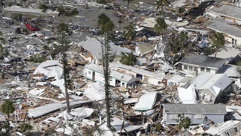 Damaged homes and debris are shown in the wake of Hurricane Ian, Thursday, Sept. 29, 2022, in Fort Myers Beach, Fla. (AP Photo/Wilfredo Lee)