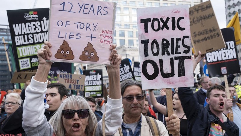 The People's Assembly Against Austerity protest to coincide with the opening of the Conservative Party Conference under the title We Will Not Pay For Their Crisis gathers outside the ICC on 2nd October 2022 in Birmingham, United Kingdom. With the cost of energy bills rising, financial turmoil in the markets following the Chancellors mini-budget, recession in the economy, and the cost of living crisis gripping households all over the country, the Peoples Assembly are holding a series of protests to unite workers and communities from all over Britain against the Tory government, and their policies. Thousands of protesters gathered holding placards for the demonstration and march. (photo by Mike Kemp/In Pictures via Getty Images)
