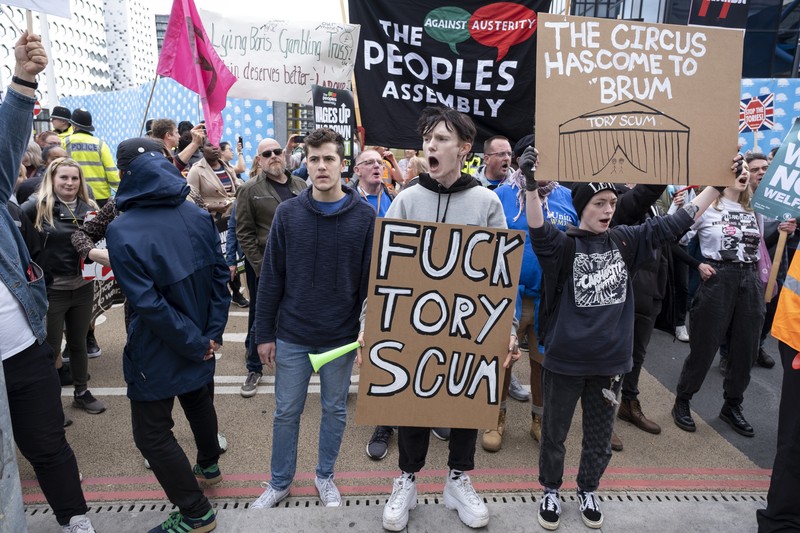 The People's Assembly Against Austerity protest to coincide with the opening of the Conservative Party Conference under the title We Will Not Pay For Their Crisis gathers outside the ICC on 2nd October 2022 in Birmingham, United Kingdom. With the cost of energy bills rising, financial turmoil in the markets following the Chancellors mini-budget, recession in the economy, and the cost of living crisis gripping households all over the country, the Peoples Assembly are holding a series of protests to unite workers and communities from all over Britain against the Tory government, and their policies. Thousands of protesters gathered holding placards for the demonstration and march. (photo by Mike Kemp/In Pictures via Getty Images)