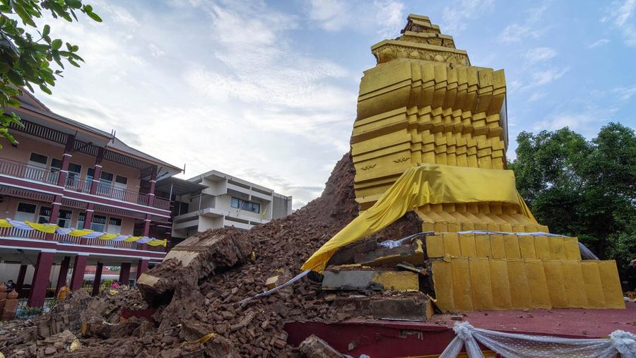CHIANG MAI, THAILAND - 2022/09/29: Part of Ancient Buddhist pagoda a 500-year-old Buddhist pagoda at Sri Suphan Temple in Muang district of Chiang Mai collapsed due to the heavy rain. Ancient Buddhist pagoda at Sri Suphan Temple, collapsed after being worn out by rain throughout the week, prompting officials from the Fine Arts Department to rush to assess the damage. (Photo by Pongmanat Tasiri/SOPA Images/LightRocket via Getty Images)