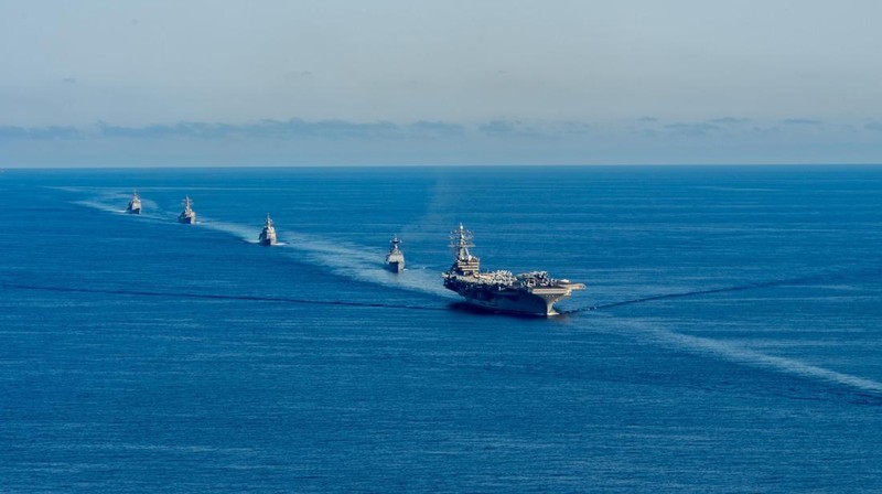 FILE - U.S. aircraft carrier USS Ronald Reagan is escorted into port in Busan, South Korea on Sept. 23, 2022. North Korea launched two short-range ballistic missiles toward its eastern waters Thursday, Oct. 6, 2022. Thursday’s launches came as the U.S. aircraft carrier USS Ronald Reagan returned to waters east of South Korea in what South Korea’s military called an attempt to demonstrate the allies’ 