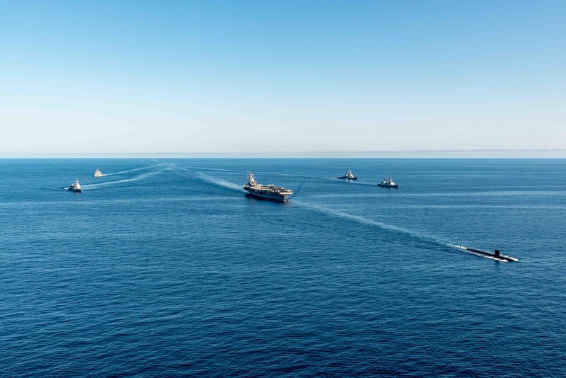 South Korea Koreas Tensions FILE - U.S. aircraft carrier USS Ronald Reagan is escorted into port in Busan, South Korea on Sept. 23, 2022. North Korea launched two short-range ballistic missiles toward its eastern waters Thursday, Oct. 6, 2022. Thursday’s launches came as the U.S. aircraft carrier USS Ronald Reagan returned to waters east of South Korea in what South Korea’s military called an attempt to demonstrate the allies’