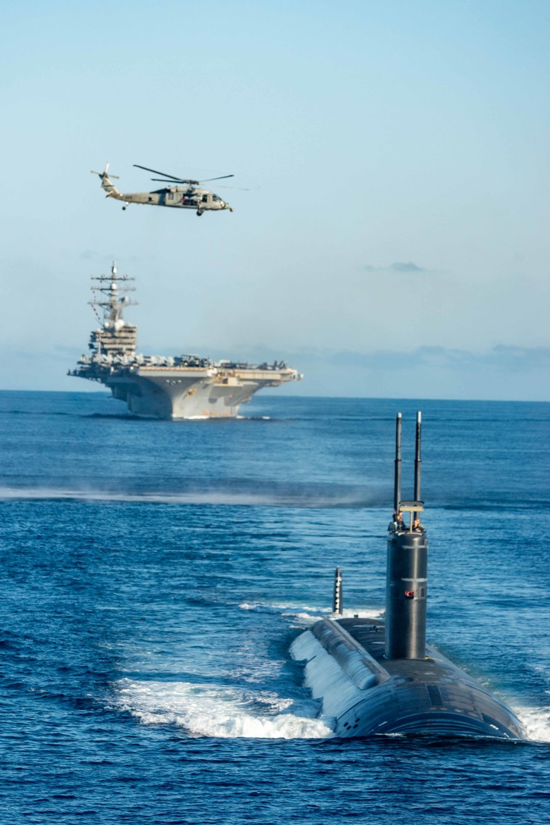 South Korea Koreas Tensions FILE - U.S. aircraft carrier USS Ronald Reagan is escorted into port in Busan, South Korea on Sept. 23, 2022. North Korea launched two short-range ballistic missiles toward its eastern waters Thursday, Oct. 6, 2022. Thursday’s launches came as the U.S. aircraft carrier USS Ronald Reagan returned to waters east of South Korea in what South Korea’s military called an attempt to demonstrate the allies’