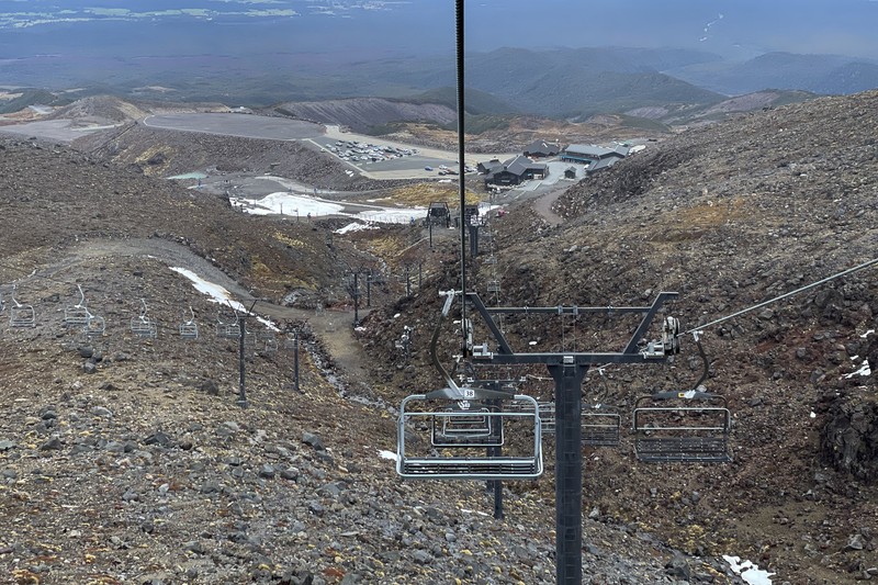 New Zealand Ski Troubles Skiers make the most of the very little snow at the Tūroa ski field, on Mt Ruapehu, New Zealand on Sept. 22, 2022. A disastrous snow season has left two of New Zealand's largest ski fields on the brink of bankruptcy, with climate change appearing to play a significant role. (AP Photo/Nick Perry)