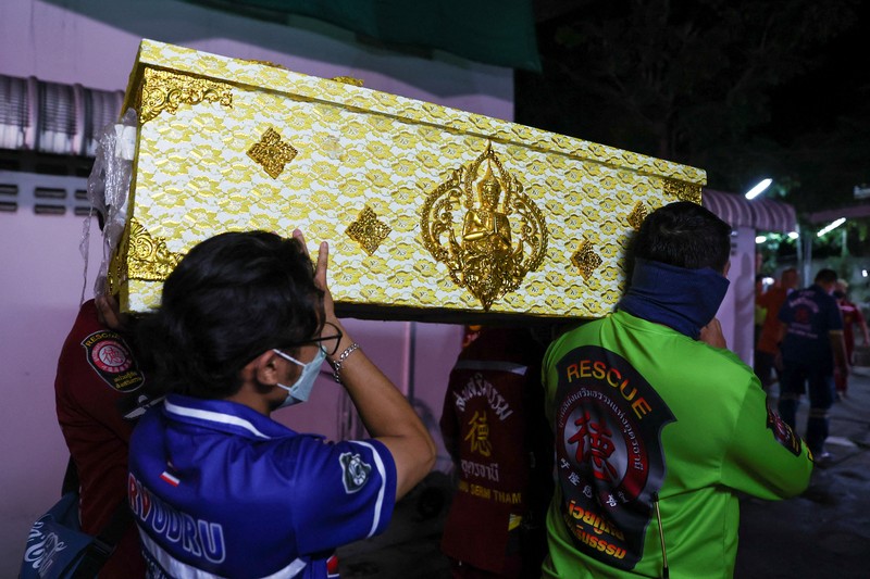 A police officer stands outside a day care center which was the scene of a mass shooting, in the town of Uthai Sawan, around 500 km northeast of Bangkok in the province of Nong Bua Lam Phu, Thailand October 6, 2022. REUTERS/Athit Perawongmetha