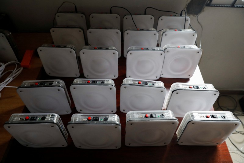 NIGERIA-SOLAR/WASTE An employee holds a handful of lithium-ion cells from old laptop battery packs at the Quadloop recycling facility in Lagos, Nigeria October 4, 2022. REUTERS/Temilade Adelaja