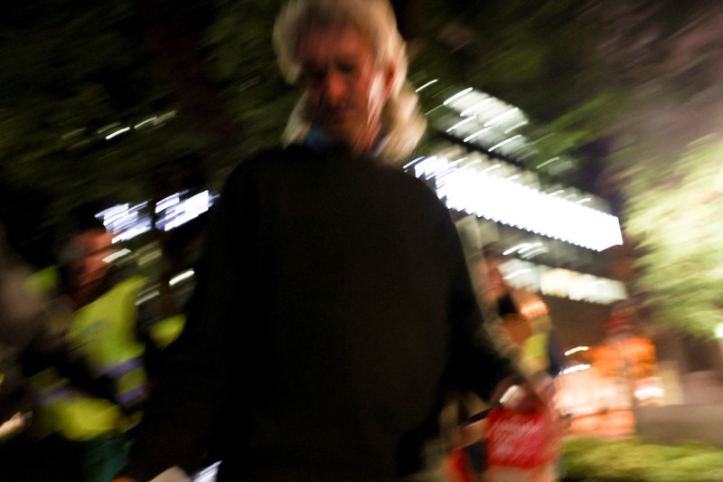 People wait in line to collect food from homeless charity CASA in central Lisbon, Portugal October 11, 2022. REUTERS/Pedro Nunes