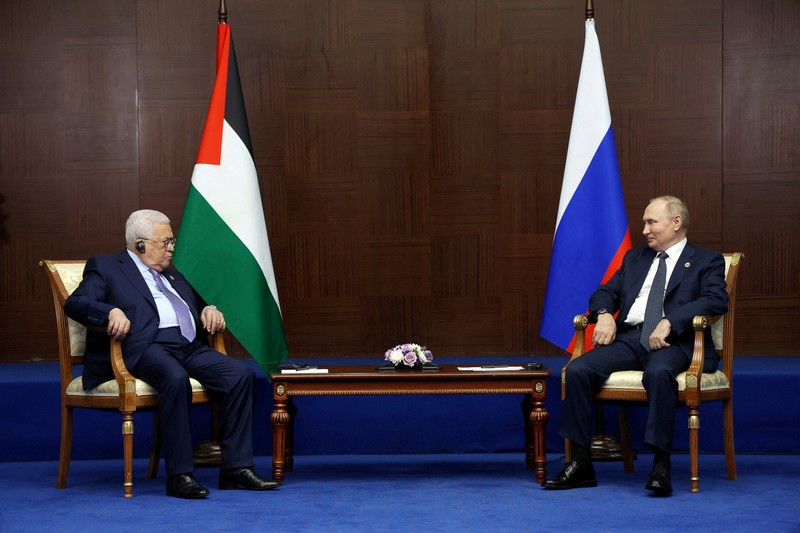 Pertemuan Presiden Rusia Vladimir Putin dan Presiden Palestina Mahmoud Abbas di sela-sela KTT Asia (CICA), di Astana, Kazakhstan Presiden Rusia Vladimir Putin bertemu dengan Presiden Palestina Mahmud Abbas di sela-sela Konferensi Tingkat Tinggi Keenam tentang Interaksi dan Tindakan Membangun Keyakinan di Asia (CICA), di Astana, Kazakhstan, Kamis (13/10/2022). (Photo by VYACHESLAV PROKOFYEV/SPUTNIK/AFP via Getty Images)