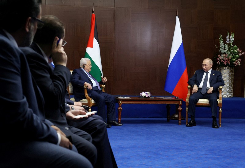 Pertemuan Presiden Rusia Vladimir Putin dan Presiden Palestina Mahmoud Abbas di sela-sela KTT Asia (CICA), di Astana, Kazakhstan Presiden Rusia Vladimir Putin bertemu dengan Presiden Palestina Mahmud Abbas di sela-sela Konferensi Tingkat Tinggi Keenam tentang Interaksi dan Tindakan Membangun Keyakinan di Asia (CICA), di Astana, Kazakhstan, Kamis (13/10/2022). (Photo by VYACHESLAV PROKOFYEV/SPUTNIK/AFP via Getty Images)