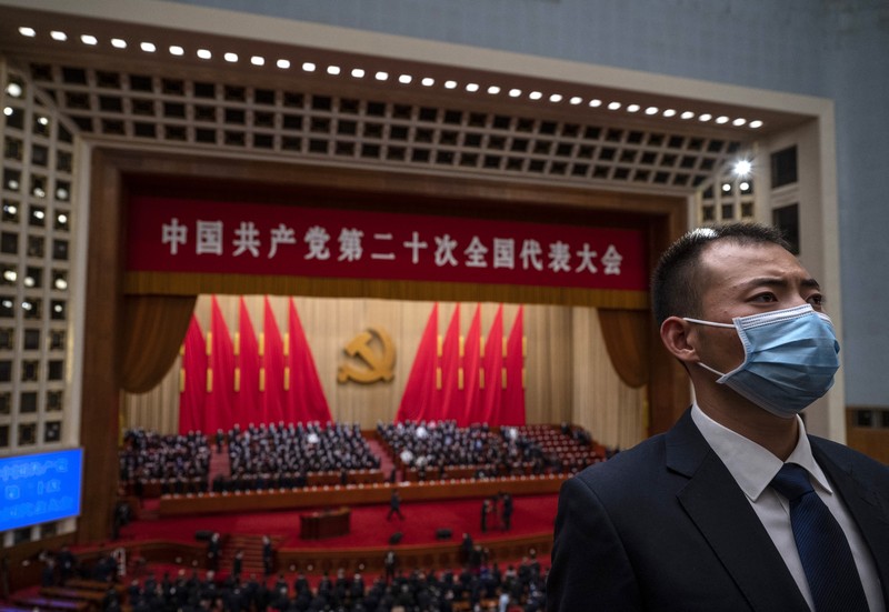 Chinese President Xi Jinping, former president Hu Jintao, Premier Li Keqiang, Chinese People's Political Consultative Conference (CPPCC) Chairman Wang Yang, and National People's Congress (NPC) Standing Committee Chairman Li Zhanshu arrive for the opening ceremony of the 20th National Congress of the Communist Party of China, at the Great Hall of the People in Beijing, China October 16, 2022. REUTERS/Thomas Peter
