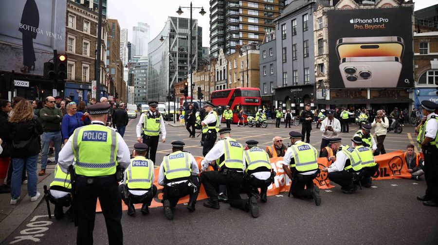 Activists block the road during a 