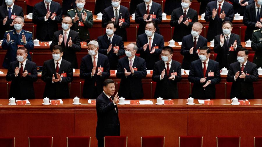Chinese President Xi Jinping waves as he arrives for the opening ceremony of the 20th National Congress of the Communist Party of China, at the Great Hall of the People in Beijing, China October 16, 2022. REUTERS/Thomas Peter TPX IMAGES OF THE DAY