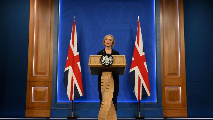 Britain's Prime Minister Liz Truss holds a press conference in the Downing Street Briefing Room in central London on October 14, 2022, following the sacking of the finance minister in response to a budget that sparked markets chaos. - Truss dismissed her finance minister, forcing Kwasi Kwarteng to carry the can for turmoil sparked by her right-wing economic platform as restive Conservatives plotted her own demise. (Photo by Daniel LEAL / POOL / AFP) (Photo by DANIEL LEAL/POOL/AFP via Getty Images)