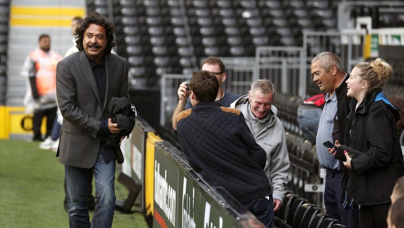 Fulham owner and Chairman Shahid Khan walks onto the Craven Cottage pitch before the match   (Photo by John Walton - PA Images via Getty Images)