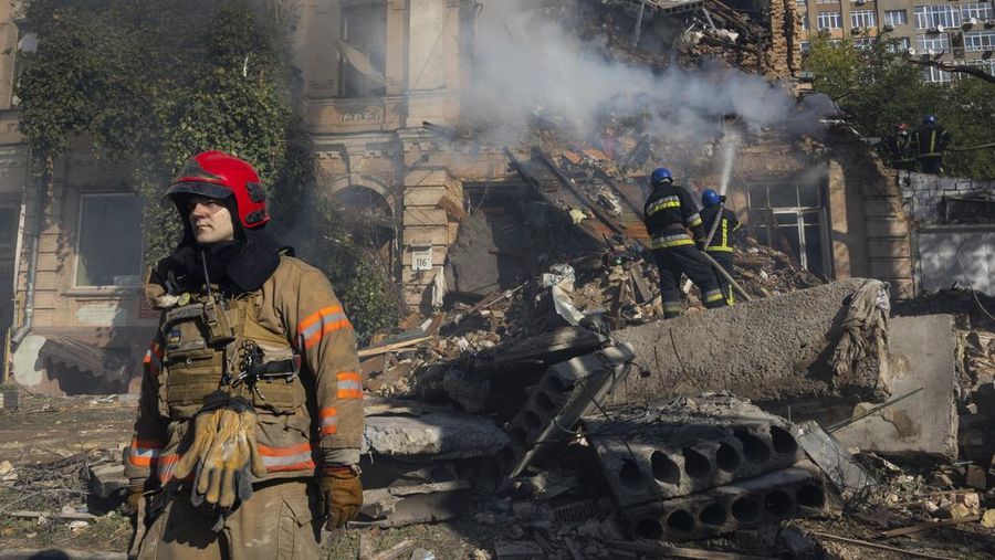 KYIV, UKRAINE - OCTOBER 17: Firefighters appear on the scene to put out a fire in a four story residential building after a