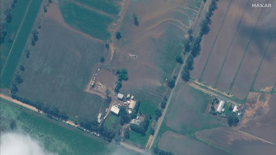 A satellite image shows a flooded road in Brewarrina, Australia, October 15, 2022. Maxar Technologies/Handout via REUTERS. ATTENTION EDITORS - THIS IMAGE HAS BEEN SUPPLIED BY A THIRD PARTY. NO RESALES. NO ARCHIVES. MANDATORY CREDIT. MUST NOT OBSCURE LOGO.