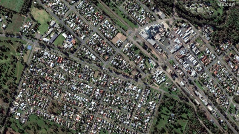 A satellite image shows a flooded road in Brewarrina, Australia, October 15, 2022. Maxar Technologies/Handout via REUTERS. ATTENTION EDITORS - THIS IMAGE HAS BEEN SUPPLIED BY A THIRD PARTY. NO RESALES. NO ARCHIVES. MANDATORY CREDIT. MUST NOT OBSCURE LOGO.
